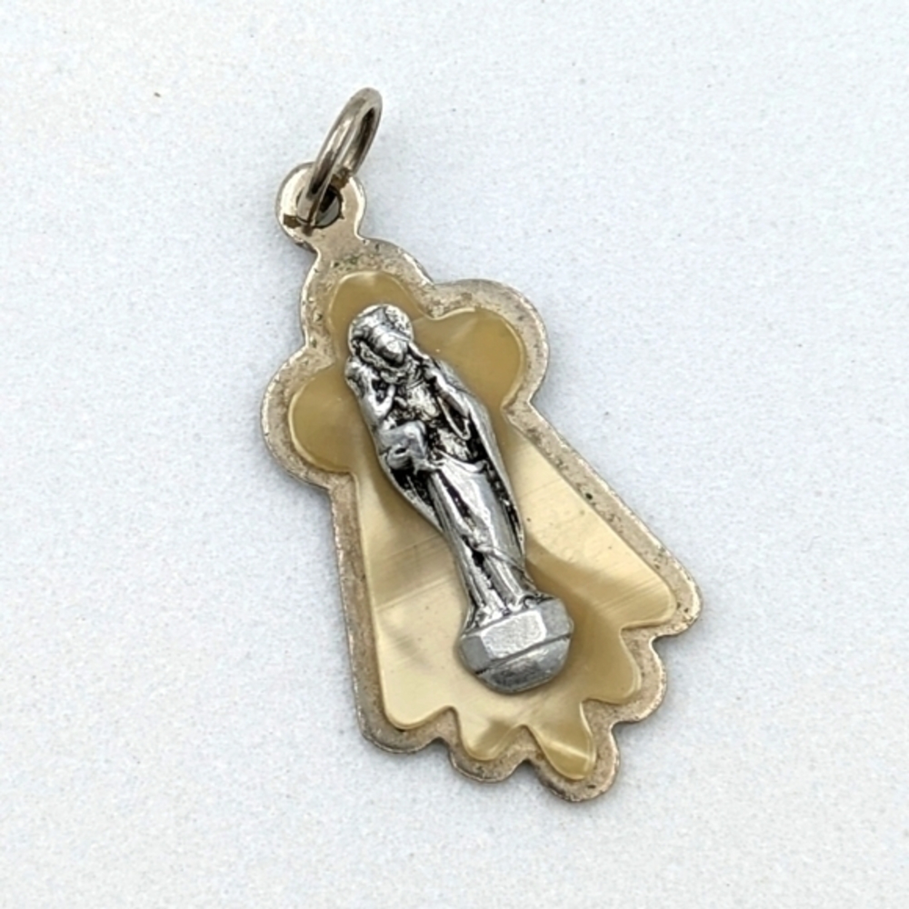 Vintage religious medallion pendant. German made celluloid and metal medallion